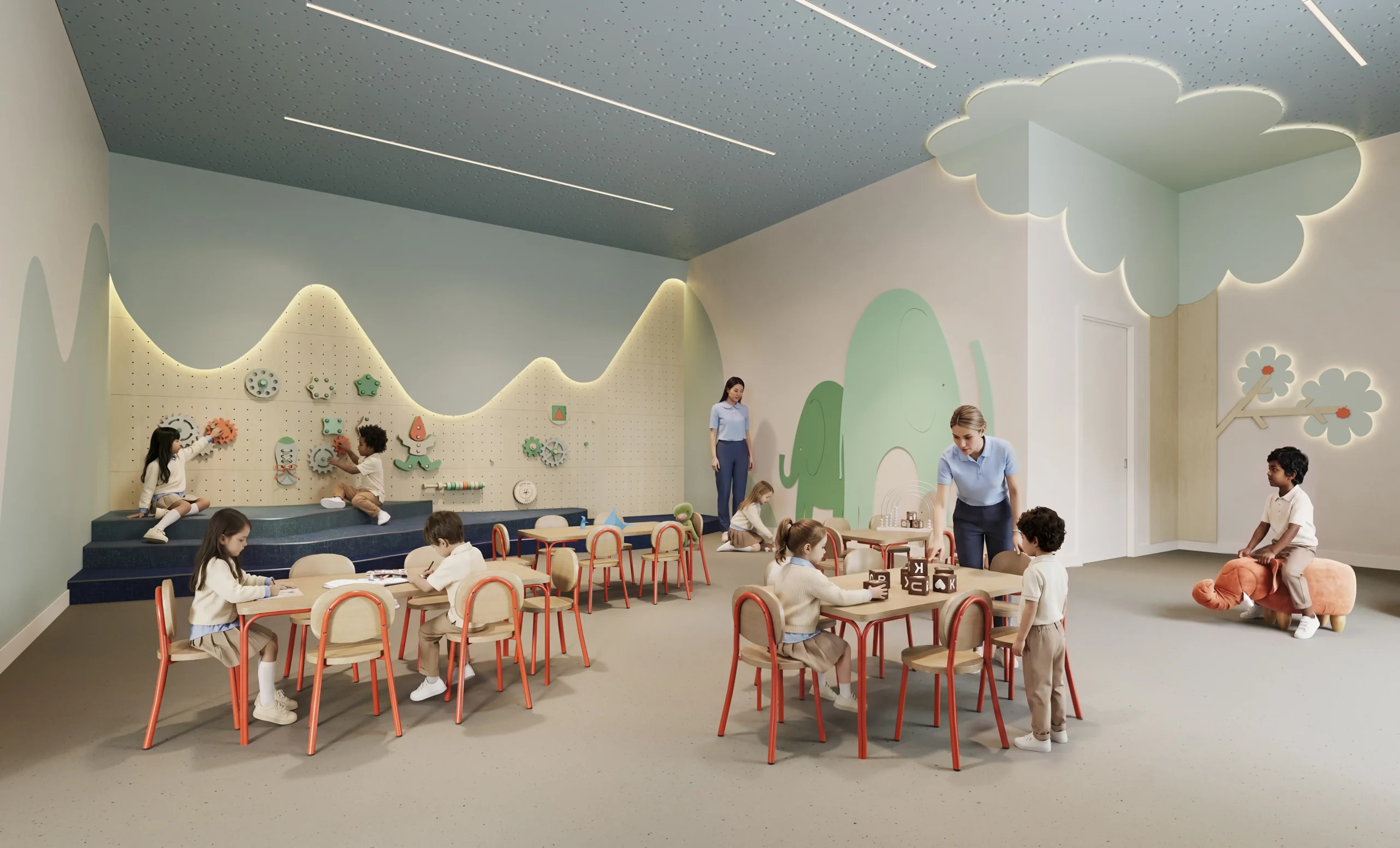 The three to five year old classroom at Kinder Roots Redbridge, with natural wood tables and soft green seating